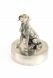 Golden Retriever estañourna plata